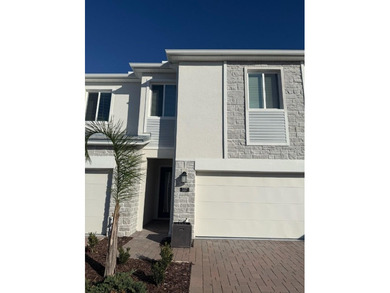 Welcome to this stunning 4-bedroom, 3.5-bath modern residence on National Golf Course in Florida - for sale on GolfHomes.com, golf home, golf lot