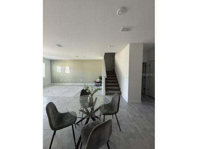 Welcome to this stunning 4-bedroom, 3.5-bath modern residence on National Golf Course in Florida - for sale on GolfHomes.com, golf home, golf lot