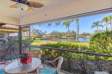 THIS GORGEOUS END UNIT TURN KEY WATER VIEW VILLA HAS BEEN on Palm Aire Country Club of Sarasota in Florida - for sale on GolfHomes.com, golf home, golf lot