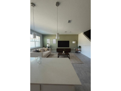 Welcome to this stunning 4-bedroom, 3.5-bath modern residence on National Golf Course in Florida - for sale on GolfHomes.com, golf home, golf lot