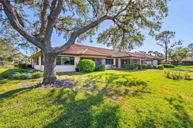 THIS GORGEOUS END UNIT TURN KEY WATER VIEW VILLA HAS BEEN on Palm Aire Country Club of Sarasota in Florida - for sale on GolfHomes.com, golf home, golf lot