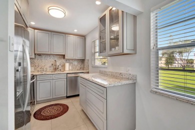 Beautifully appointed Corner unit  with Central AC is offered on Southwinds Golf Course in Florida - for sale on GolfHomes.com, golf home, golf lot