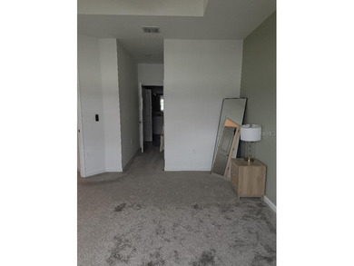 Welcome to this stunning 4-bedroom, 3.5-bath modern residence on National Golf Course in Florida - for sale on GolfHomes.com, golf home, golf lot