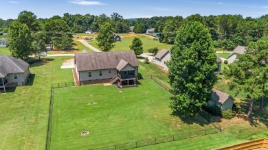 Welcome to this beautiful Southern charmer that perfectly blends on Woodfin Ridge Golf Club in South Carolina - for sale on GolfHomes.com, golf home, golf lot