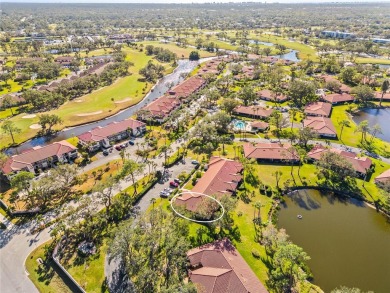 THIS GORGEOUS END UNIT TURN KEY WATER VIEW VILLA HAS BEEN on Palm Aire Country Club of Sarasota in Florida - for sale on GolfHomes.com, golf home, golf lot