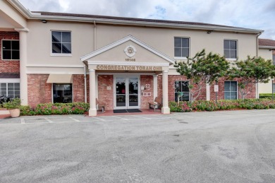 Beautifully appointed Corner unit  with Central AC is offered on Southwinds Golf Course in Florida - for sale on GolfHomes.com, golf home, golf lot