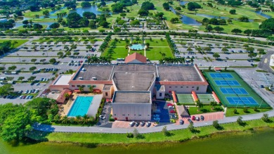 Beautifully appointed Corner unit  with Central AC is offered on Southwinds Golf Course in Florida - for sale on GolfHomes.com, golf home, golf lot