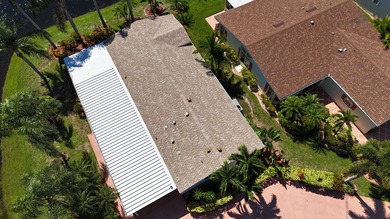 Rare corner-lot waterfront gem with wraparound water and golf on Savanna Golf Club in Florida - for sale on GolfHomes.com, golf home, golf lot