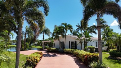 RARE CORNER-LOT WATERFRONT HOME WITH WRAPAROUND WATER AND GOLF on Savanna Golf Club in Florida - for sale on GolfHomes.com, golf home, golf lot