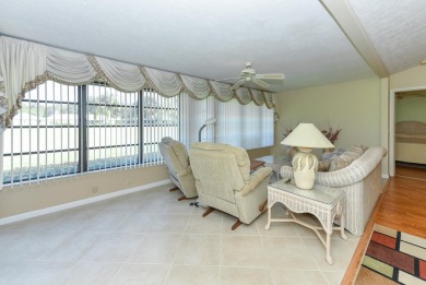 Discover the serene lifestyle of Eaglewood with this charming on Eagle Wood Golf Course in Florida - for sale on GolfHomes.com, golf home, golf lot