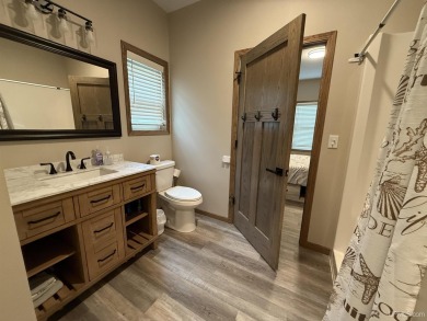 This is still like a brand new home! Seller bought in 2023 and on Portage Lake Golf Course in Michigan - for sale on GolfHomes.com, golf home, golf lot