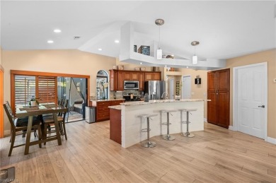 This beautifully updated 3-bed+ den home, seamlessly blends on Gateway Golf and Country Club in Florida - for sale on GolfHomes.com, golf home, golf lot