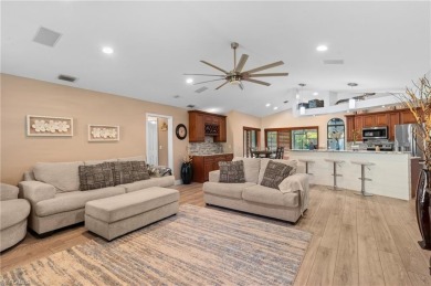 This beautifully updated 3-bed+ den home, seamlessly blends on Gateway Golf and Country Club in Florida - for sale on GolfHomes.com, golf home, golf lot