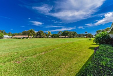 Discover the serene lifestyle of Eaglewood with this charming on Eagle Wood Golf Course in Florida - for sale on GolfHomes.com, golf home, golf lot