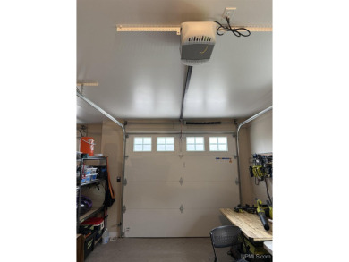 This is still like a brand new home! Seller bought in 2023 and on Portage Lake Golf Course in Michigan - for sale on GolfHomes.com, golf home, golf lot