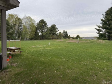 This is still like a brand new home! Seller bought in 2023 and on Portage Lake Golf Course in Michigan - for sale on GolfHomes.com, golf home, golf lot