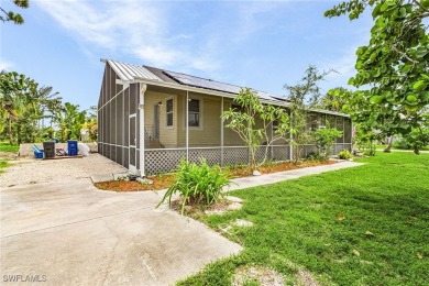 Island Charm Meets Modern Comfort - Welcome to 7256 Victory Road on Alden Pines Golf Club in Florida - for sale on GolfHomes.com, golf home, golf lot