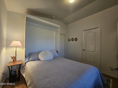 Spacious and elegant, this 2-bedroom, 2-bathroom home boasts a on Viewpoint Golf Resort in Arizona - for sale on GolfHomes.com, golf home, golf lot