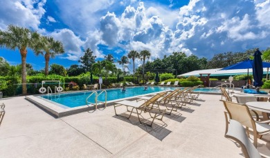 Discover the serene lifestyle of Eaglewood with this charming on Eagle Wood Golf Course in Florida - for sale on GolfHomes.com, golf home, golf lot