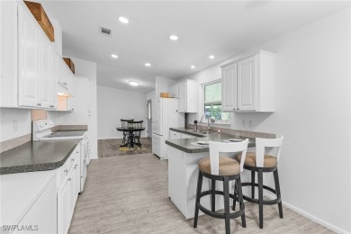 Island Charm Meets Modern Comfort - Welcome to 7256 Victory Road on Alden Pines Golf Club in Florida - for sale on GolfHomes.com, golf home, golf lot