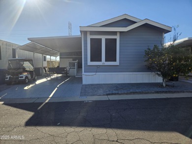 Spacious and elegant, this 2-bedroom, 2-bathroom home boasts a on Viewpoint Golf Resort in Arizona - for sale on GolfHomes.com, golf home, golf lot
