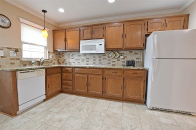 This lovely Baronet model is an end-unit with tasteful upgrades on Leisure Village Golf Course in New York - for sale on GolfHomes.com, golf home, golf lot