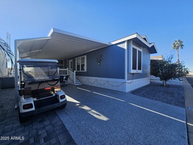 Spacious and elegant, this 2-bedroom, 2-bathroom home boasts a on Viewpoint Golf Resort in Arizona - for sale on GolfHomes.com, golf home, golf lot