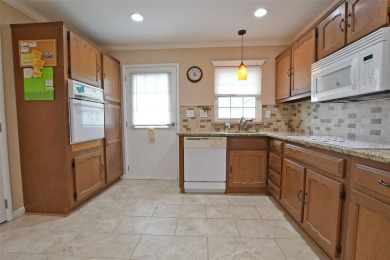 This lovely Baronet model is an end-unit with tasteful upgrades on Leisure Village Golf Course in New York - for sale on GolfHomes.com, golf home, golf lot