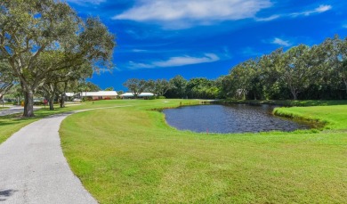 Discover the serene lifestyle of Eaglewood with this charming on Eagle Wood Golf Course in Florida - for sale on GolfHomes.com, golf home, golf lot