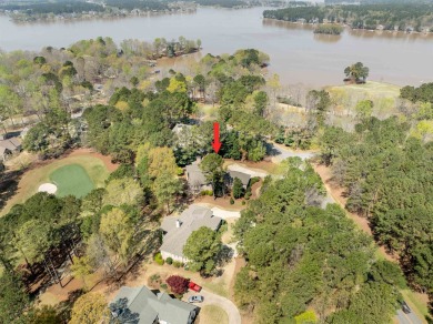 Nestled gracefully on the picturesque 10th hole of the renowned on Reynolds Lake Oconee - Great Waters Course in Georgia - for sale on GolfHomes.com, golf home, golf lot