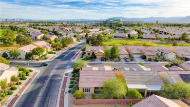 Situated w/in the esteemed 55+ community of Sun City Aliante on Aliante Golf Club in Nevada - for sale on GolfHomes.com, golf home, golf lot
