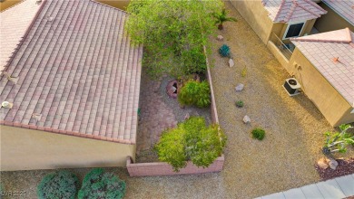 Situated w/in the esteemed 55+ community of Sun City Aliante on Aliante Golf Club in Nevada - for sale on GolfHomes.com, golf home, golf lot