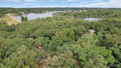 Completed in March 2025, this nearly brand-new chalet features on Innsbrook Resort Golf Course in Missouri - for sale on GolfHomes.com, golf home, golf lot
