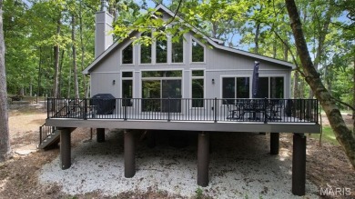 Completed in March 2025, this nearly brand-new chalet features on Innsbrook Resort Golf Course in Missouri - for sale on GolfHomes.com, golf home, golf lot