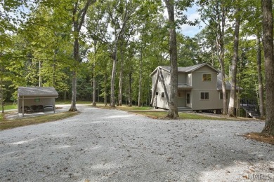 Completed in March 2025, this nearly brand-new chalet features on Innsbrook Resort Golf Course in Missouri - for sale on GolfHomes.com, golf home, golf lot