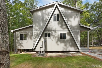 Completed in March 2025, this nearly brand-new chalet features on Innsbrook Resort Golf Course in Missouri - for sale on GolfHomes.com, golf home, golf lot
