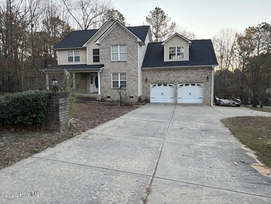 This stunning single-family home located in a gated community at on Carolina Lakes Country Club in North Carolina - for sale on GolfHomes.com, golf home, golf lot