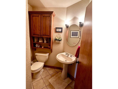 This stunning custom built home by K.G. Day Builders has on Winfield Country Club in Kansas - for sale on GolfHomes.com, golf home, golf lot