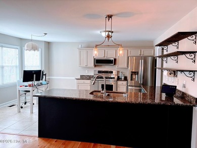 This stunning single-family home located in a gated community at on Carolina Lakes Country Club in North Carolina - for sale on GolfHomes.com, golf home, golf lot