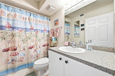 Beautiful move in ready FIRST FLOOR condo with a prime lake view on Bonita Fairways in Florida - for sale on GolfHomes.com, golf home, golf lot