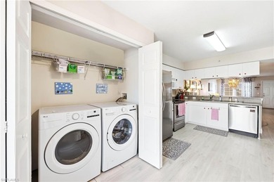 Beautiful move in ready FIRST FLOOR condo with a prime lake view on Bonita Fairways in Florida - for sale on GolfHomes.com, golf home, golf lot