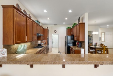 Step into an open floorplan featuring a dining area and a on Heritage Palms Golf Club in California - for sale on GolfHomes.com, golf home, golf lot