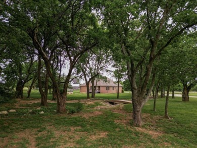 This stunning custom built home by K.G. Day Builders has on Winfield Country Club in Kansas - for sale on GolfHomes.com, golf home, golf lot