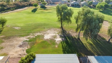 Located on the 13th Fairway, boasting breathtaking views of the on Mojave Resort Golf Club in Nevada - for sale on GolfHomes.com, golf home, golf lot