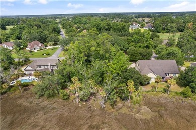 Situated in the desirable Oak Grove Island community, 146 Harbor on Oak Grove Island Golf and Country Club in Georgia - for sale on GolfHomes.com, golf home, golf lot