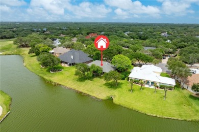 Elegant all-brick that overlooks a pond, Rockport golf course on Rockport Country Club in Texas - for sale on GolfHomes.com, golf home, golf lot