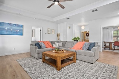 Elegant all-brick that overlooks a pond, Rockport golf course on Rockport Country Club in Texas - for sale on GolfHomes.com, golf home, golf lot