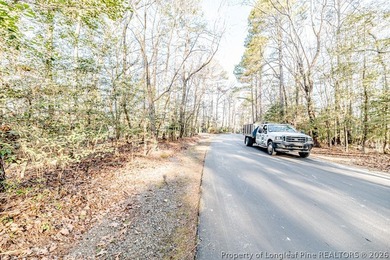 Discover the perfect place to build in the gated community of on Carolina Trace Country Club in North Carolina - for sale on GolfHomes.com, golf home, golf lot