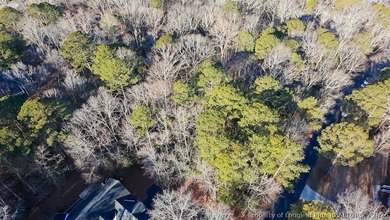 Discover the perfect place to build in the gated community of on Carolina Trace Country Club in North Carolina - for sale on GolfHomes.com, golf home, golf lot