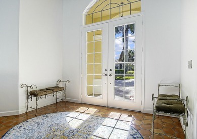 Beautiful three bedroom three bathroom custom home positioned on on Meadowood Golf and Tennis Club in Florida - for sale on GolfHomes.com, golf home, golf lot